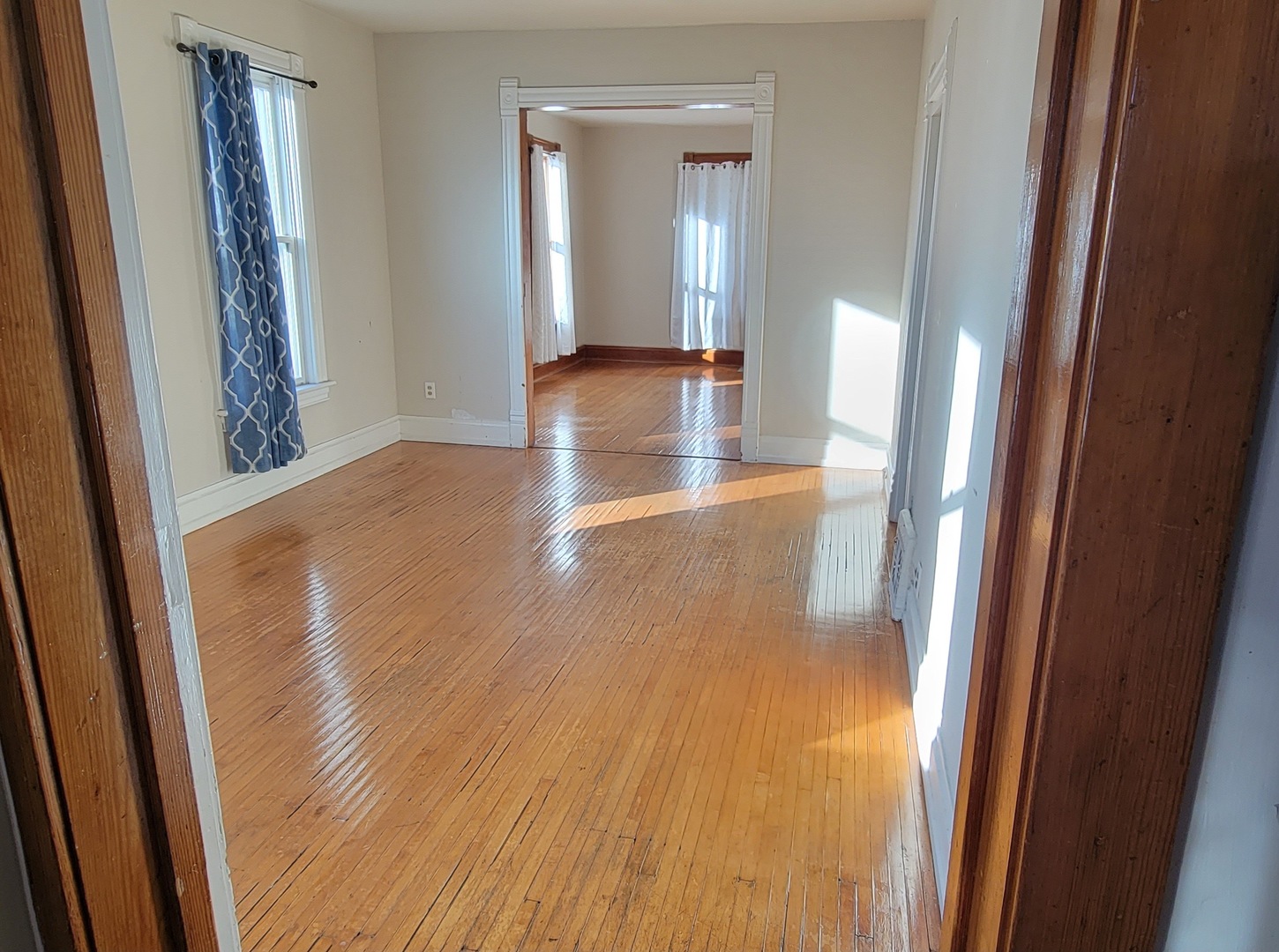 633 Chester Avenue Elgin, IL 60120 - Photo 6 of 29 a view of a hallway with wooden floor
