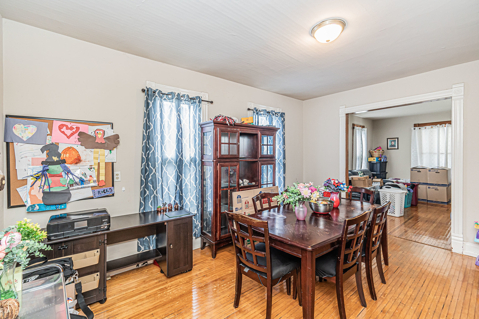 633 Chester Avenue Elgin, IL 60120 - Photo 9 of 29 a dining room with furniture and wooden floor