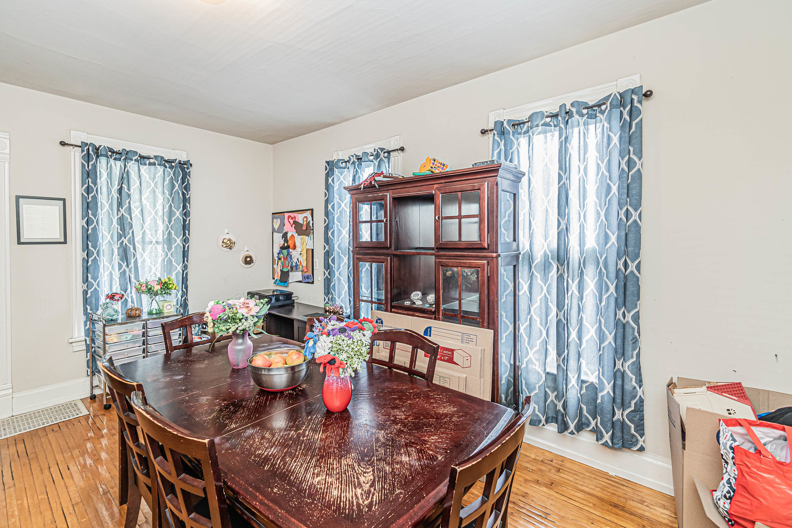 633 Chester Avenue Elgin, IL 60120 - Photo 10 of 29 a dining room with furniture and wooden floor