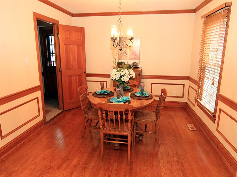 116 Hartland Court Raleigh, NC 27614 - Photo 8 of 25 Separate dining room to be shared with family and friends or for an intimate dinner. Wallpaper has been removed and most of the home painted a neutral color so that you can enjoy this home as soon as you move in. Dining Room