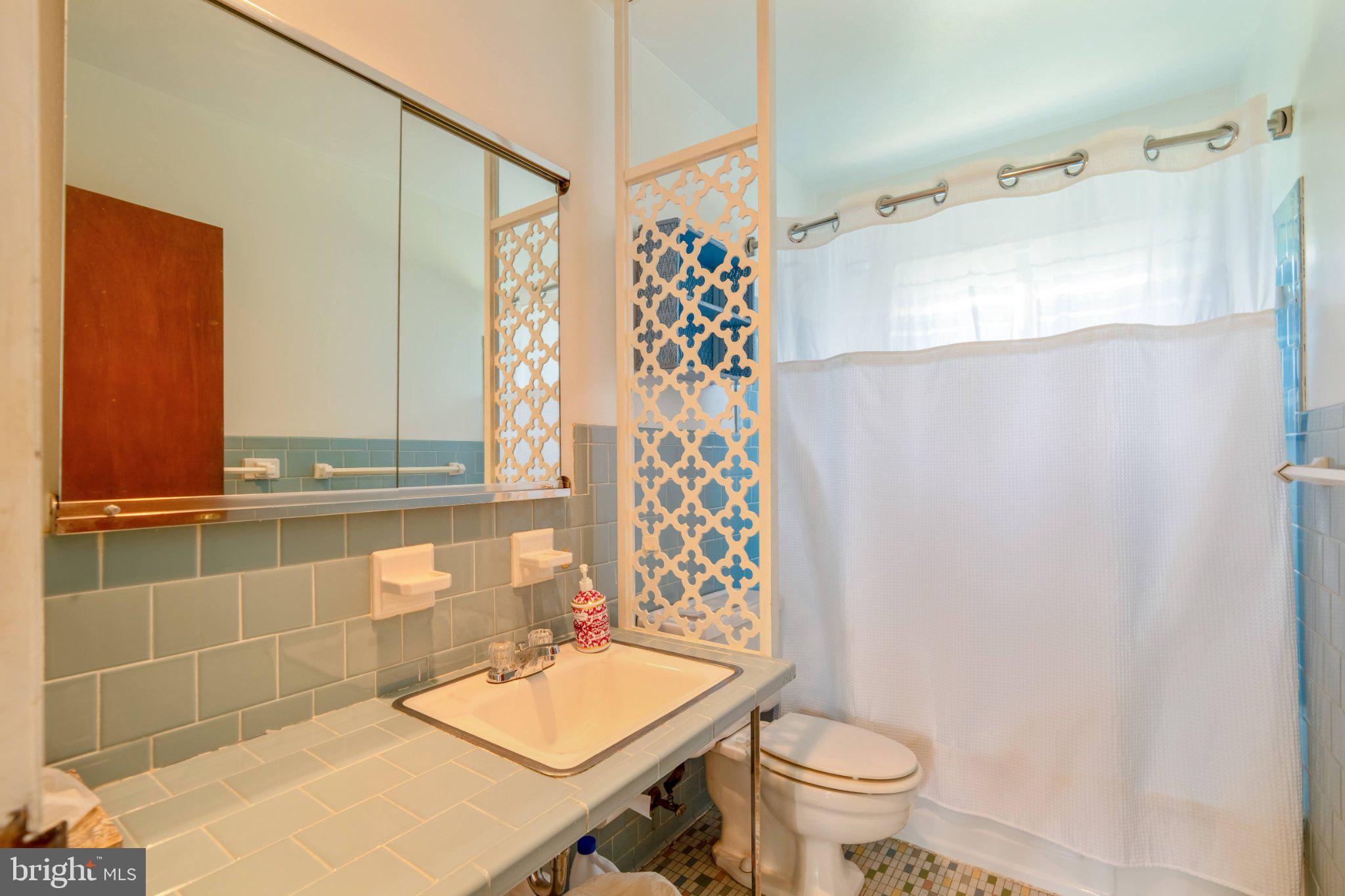 6812 Fox Meadow Road Baltimore, MD 21207 - Photo 14 of 27 Bathroom with vintage tiles.