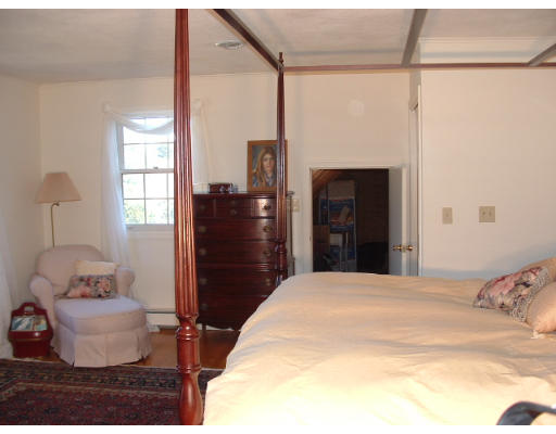 249 Rice Road Wayland, MA 01778 - Photo 17 of 26 a bedroom with a bed and a window