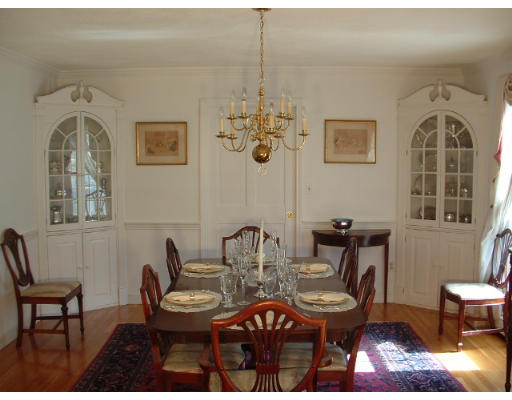 249 Rice Road Wayland, MA 01778 - Photo 7 of 26 a view of a dining room with furniture and chandelier