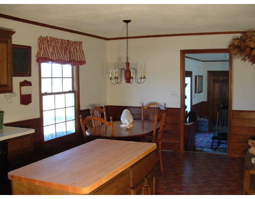 249 Rice Road Wayland, MA 01778 - Photo 10 of 26 a living room with furniture and a window