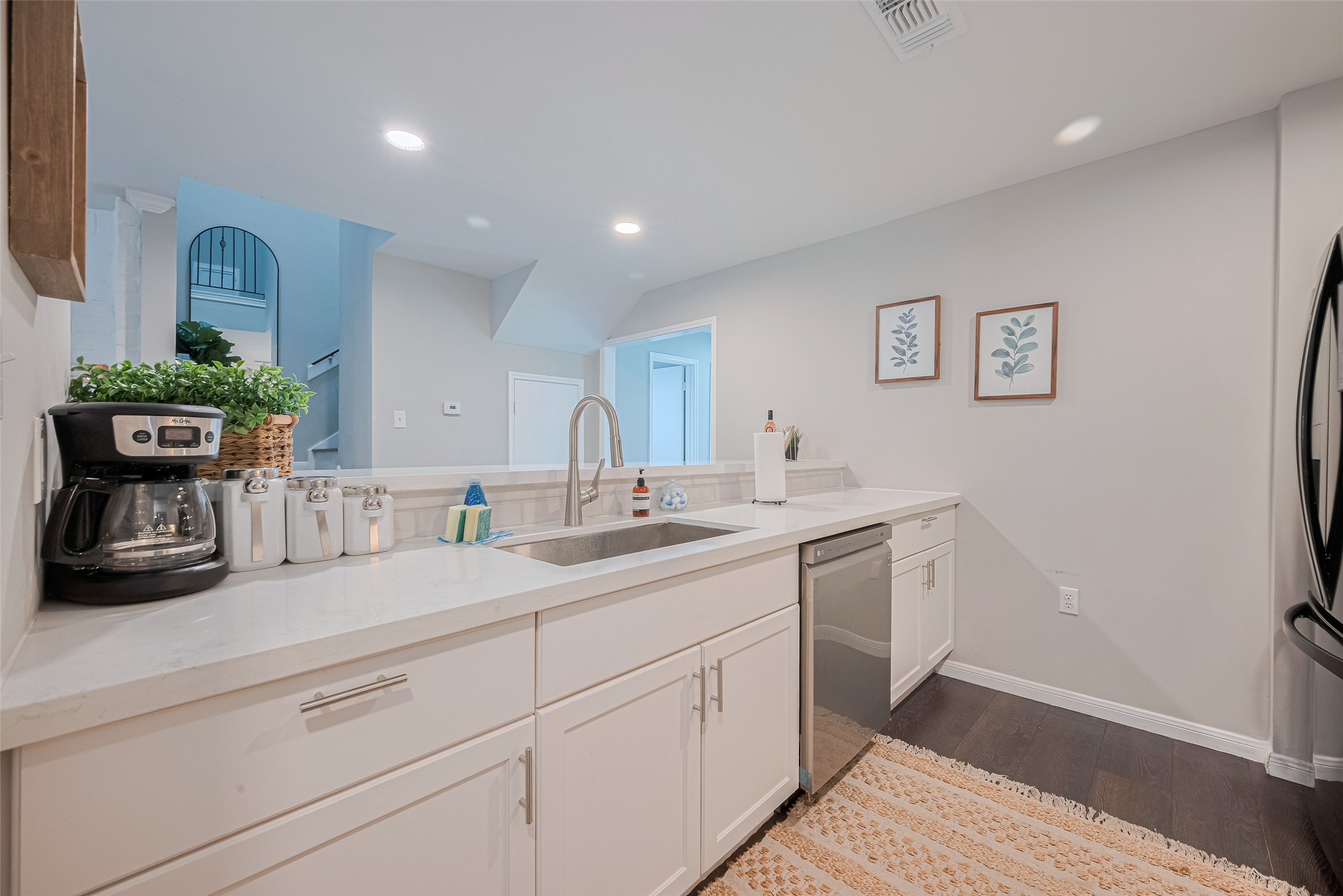 14688 Perthshire Road, Unit C Houston, TX 77079 - Photo 12 of 42 a kitchen with a sink and cabinets