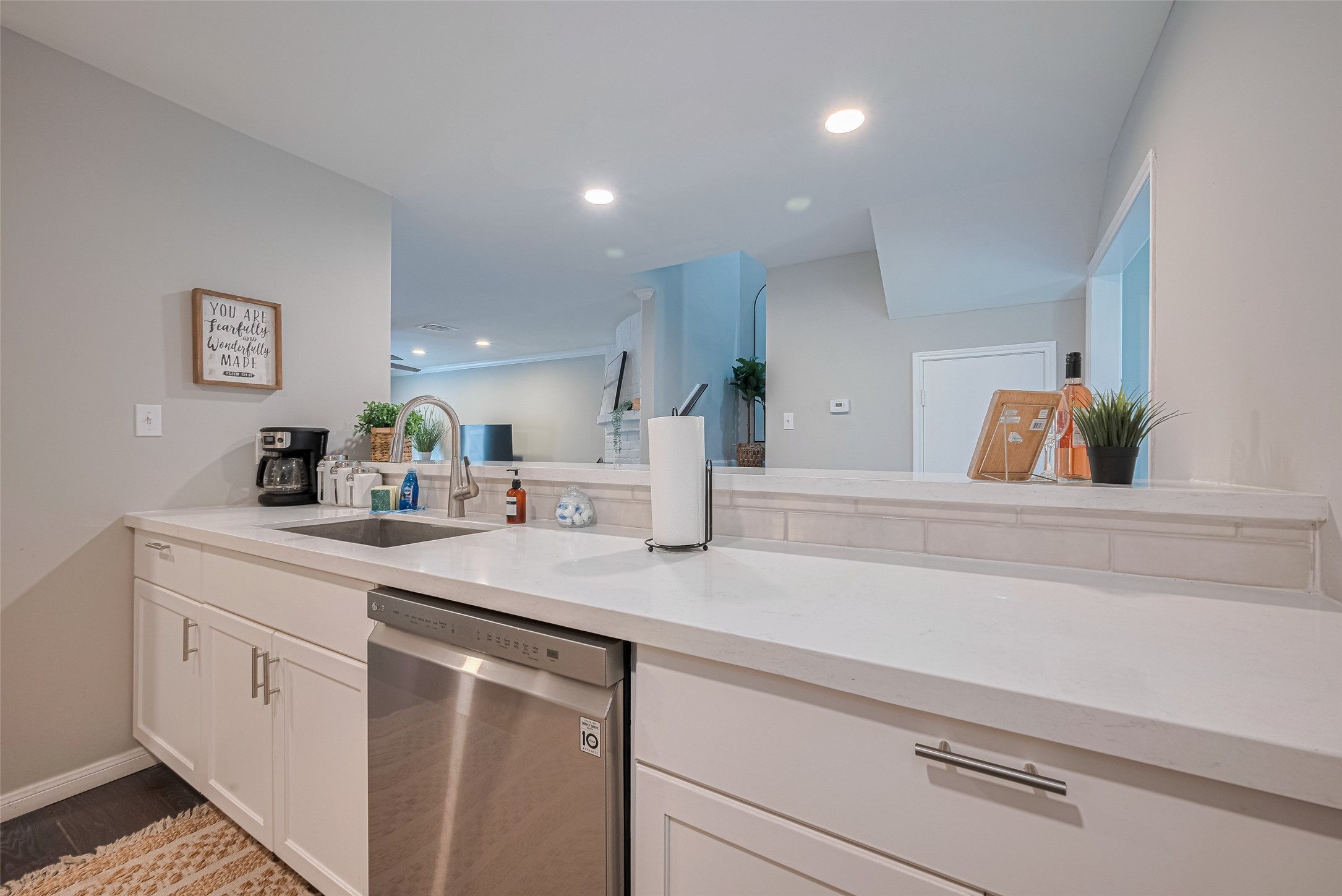 14688 Perthshire Road, Unit C Houston, TX 77079 - Photo 14 of 42 a kitchen with a sink and cabinets
