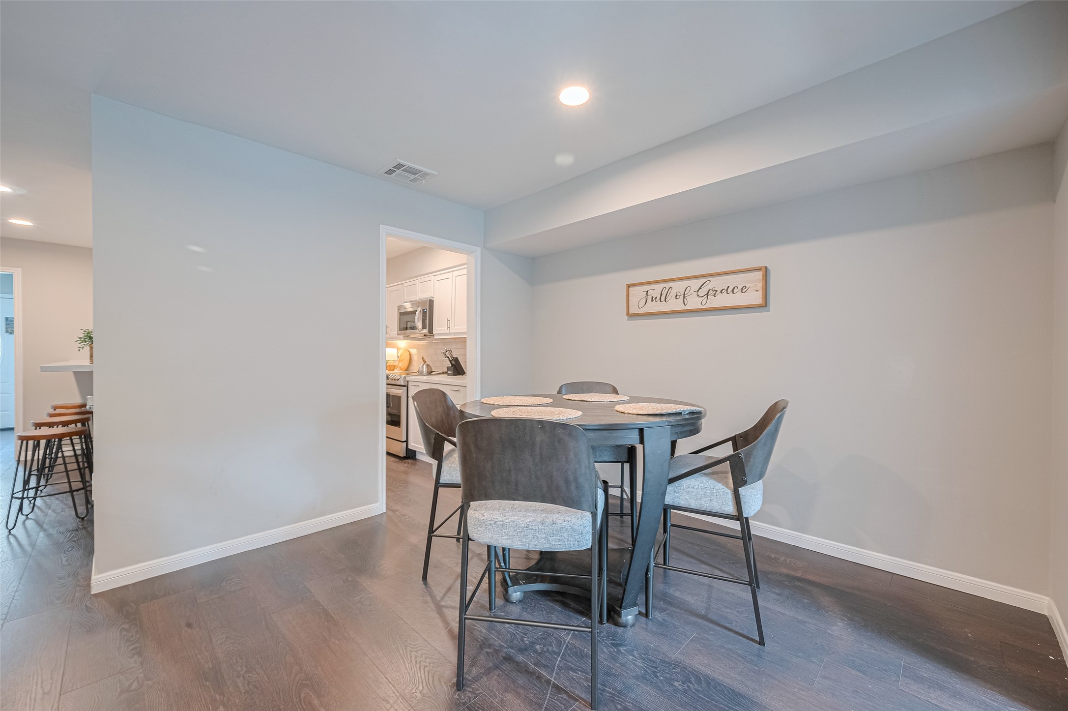 14688 Perthshire Road, Unit C Houston, TX 77079 - Photo 19 of 42 a view of a dining room with furniture