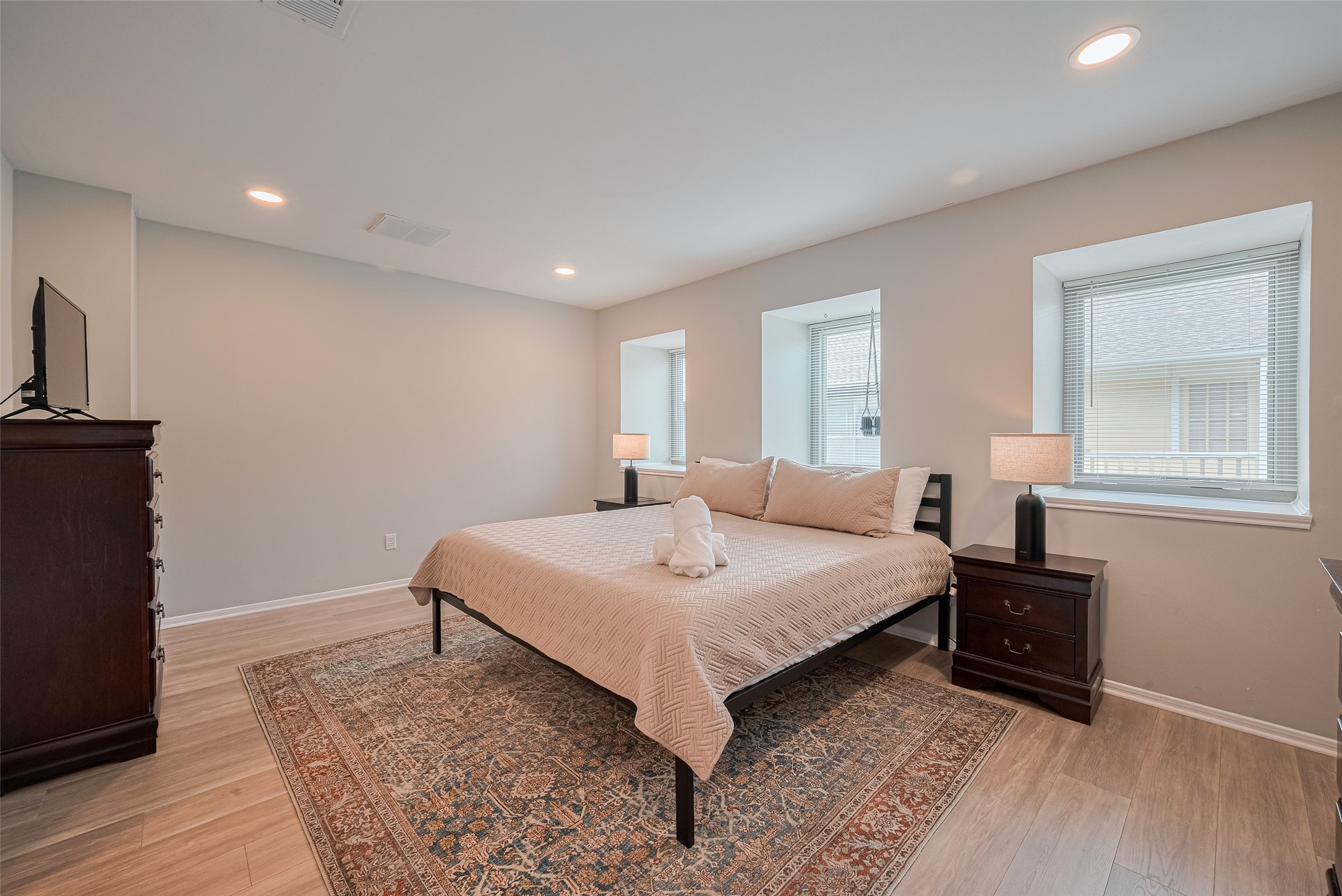 14688 Perthshire Road, Unit C Houston, TX 77079 - Photo 23 of 42 a bed room with a bed and a window