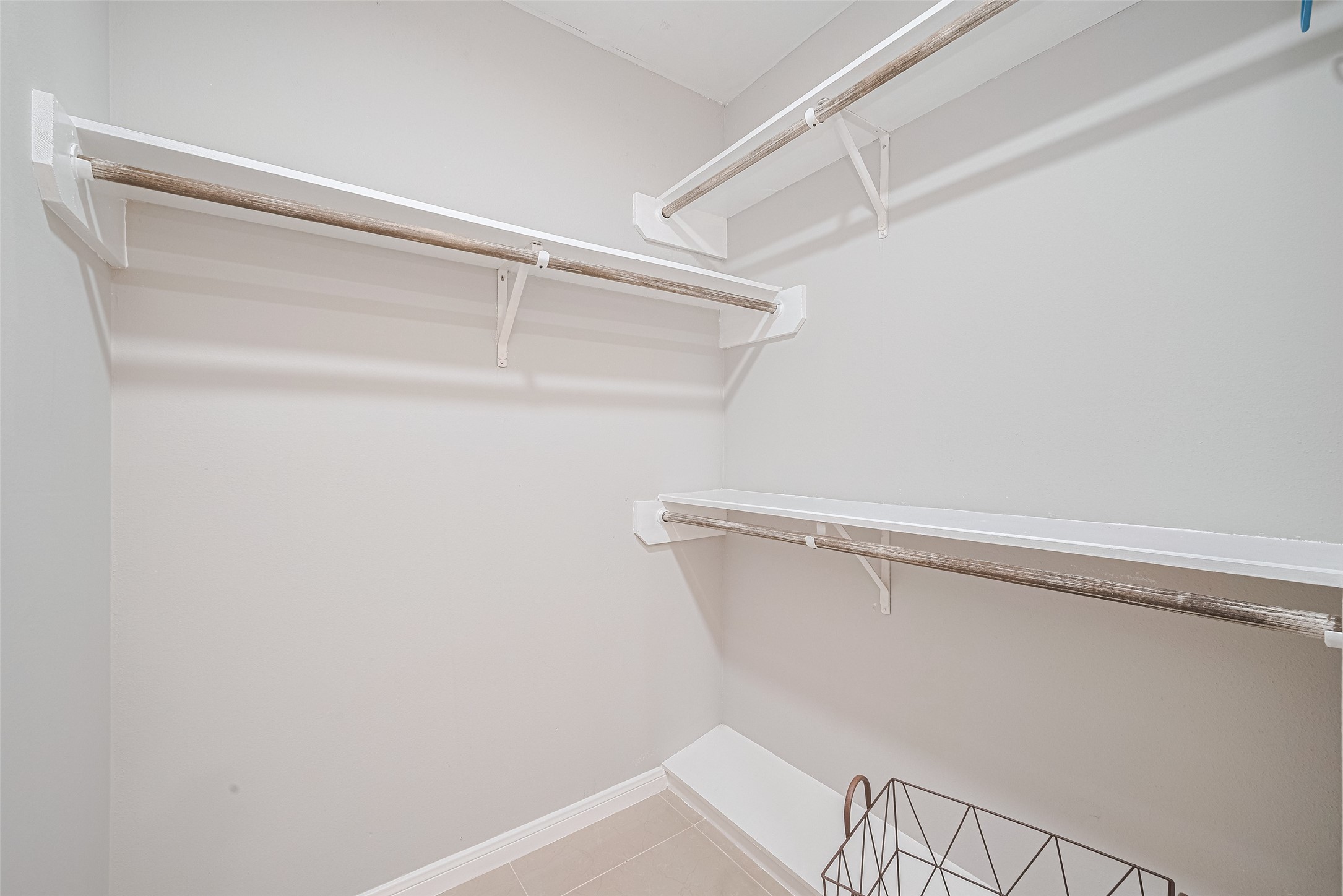 14688 Perthshire Road, Unit C Houston, TX 77079 - Photo 28 of 42 a view of a room with racks on the wall