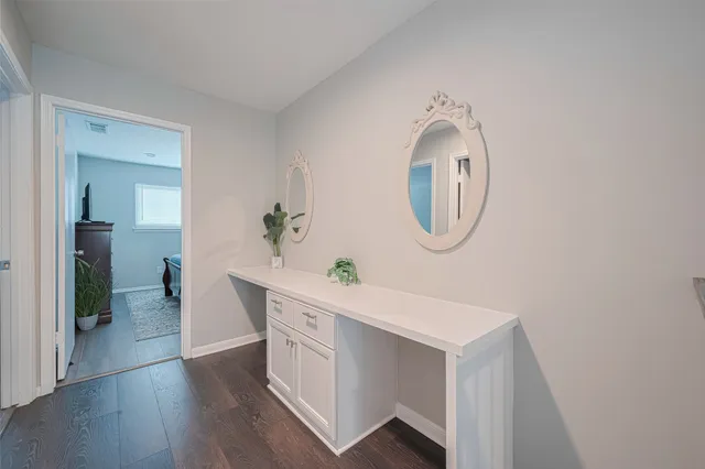 a living room with wooden floor