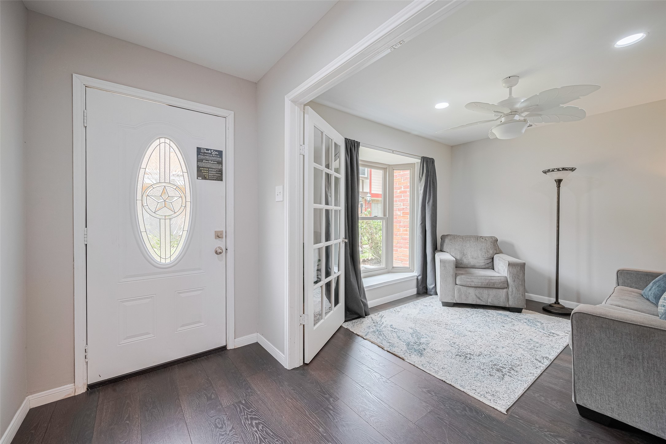 14688 Perthshire Road, Unit C Houston, TX 77079 - Photo 3 of 42 a living room with furniture and a large window