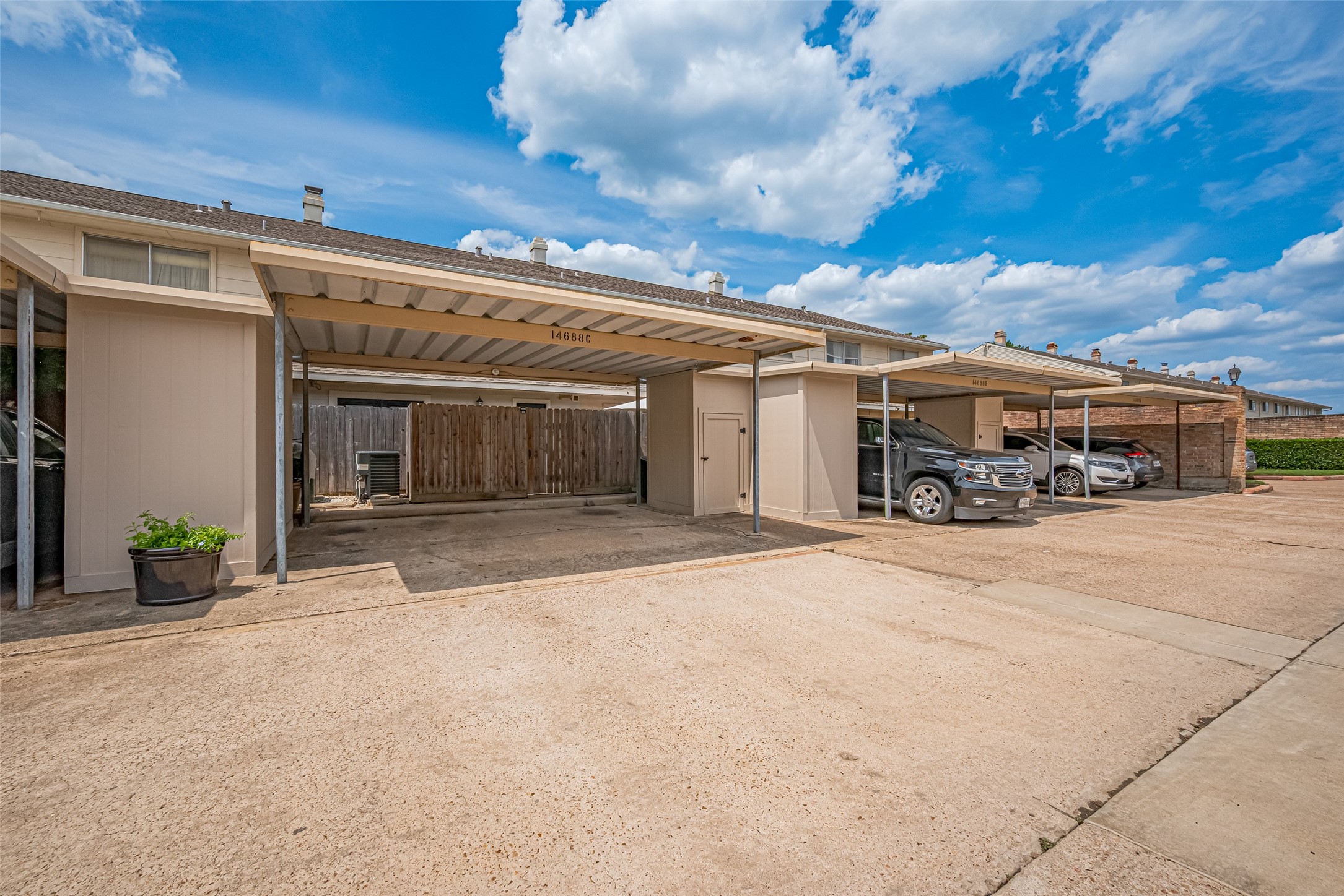 14688 Perthshire Road, Unit C Houston, TX 77079 - Photo 37 of 42 a front view of a house with a yard
