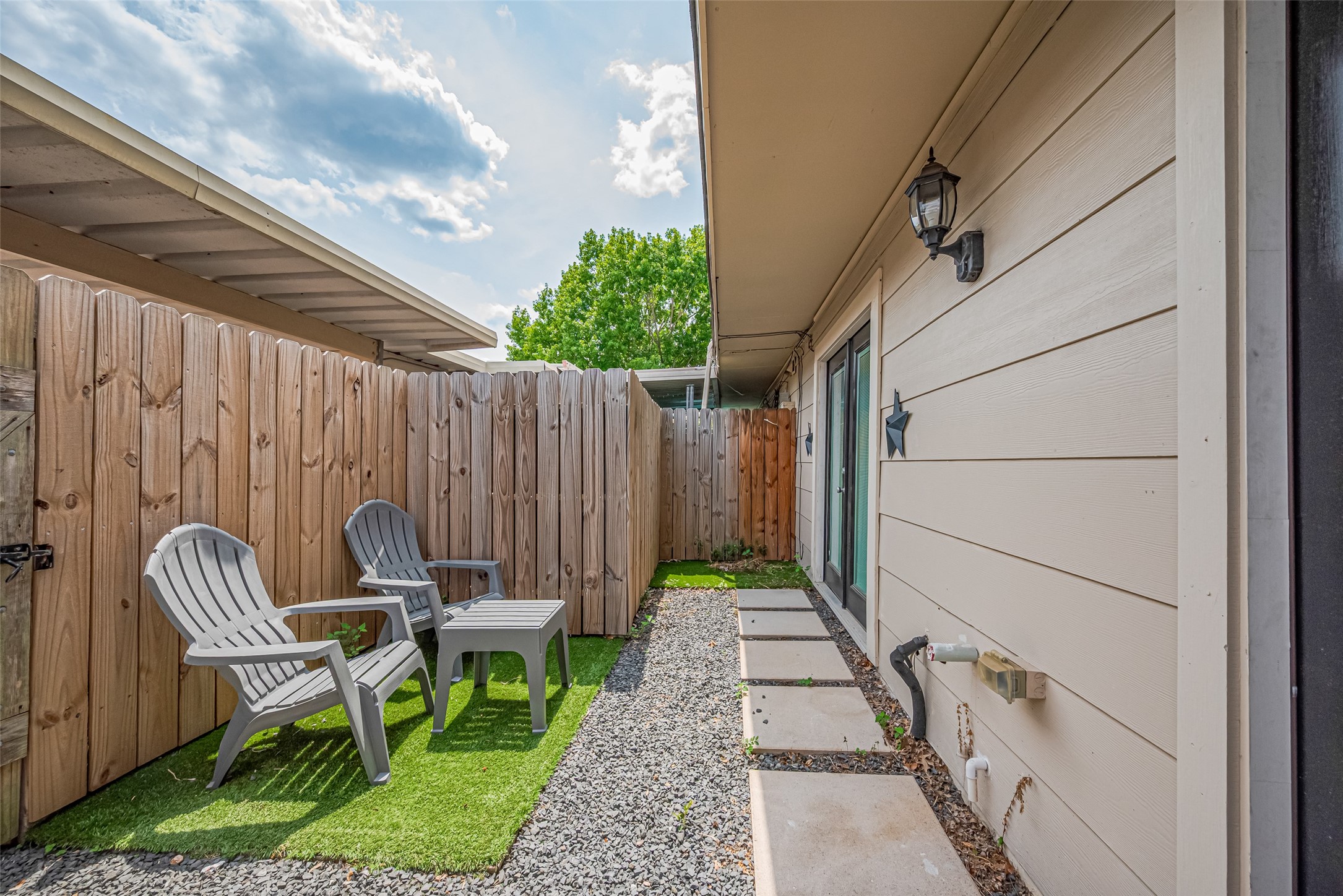 14688 Perthshire Road, Unit C Houston, TX 77079 - Photo 38 of 42 a view of two chairs in the patio