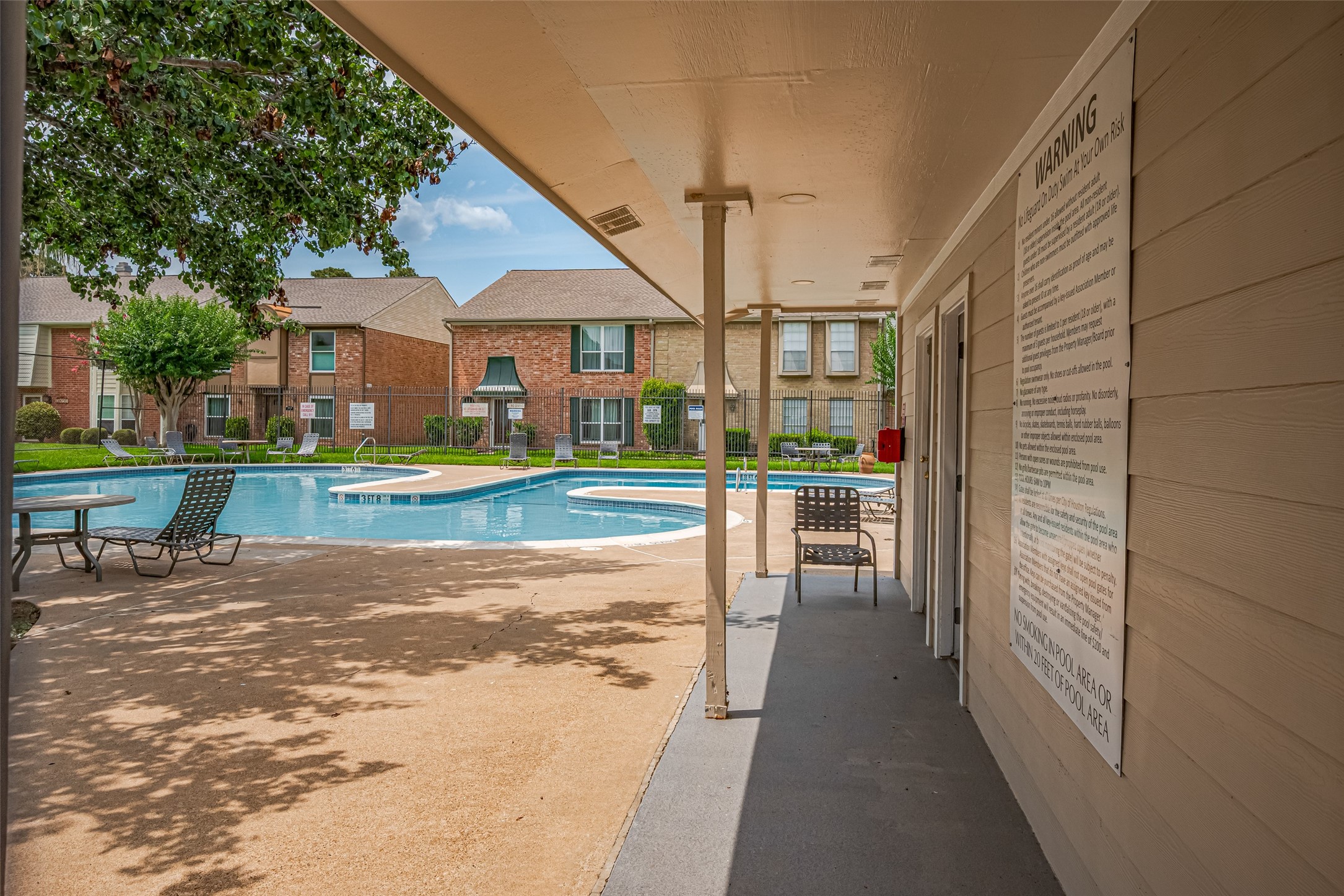 14688 Perthshire Road, Unit C Houston, TX 77079 - Photo 39 of 42 a view of a house with a yard
