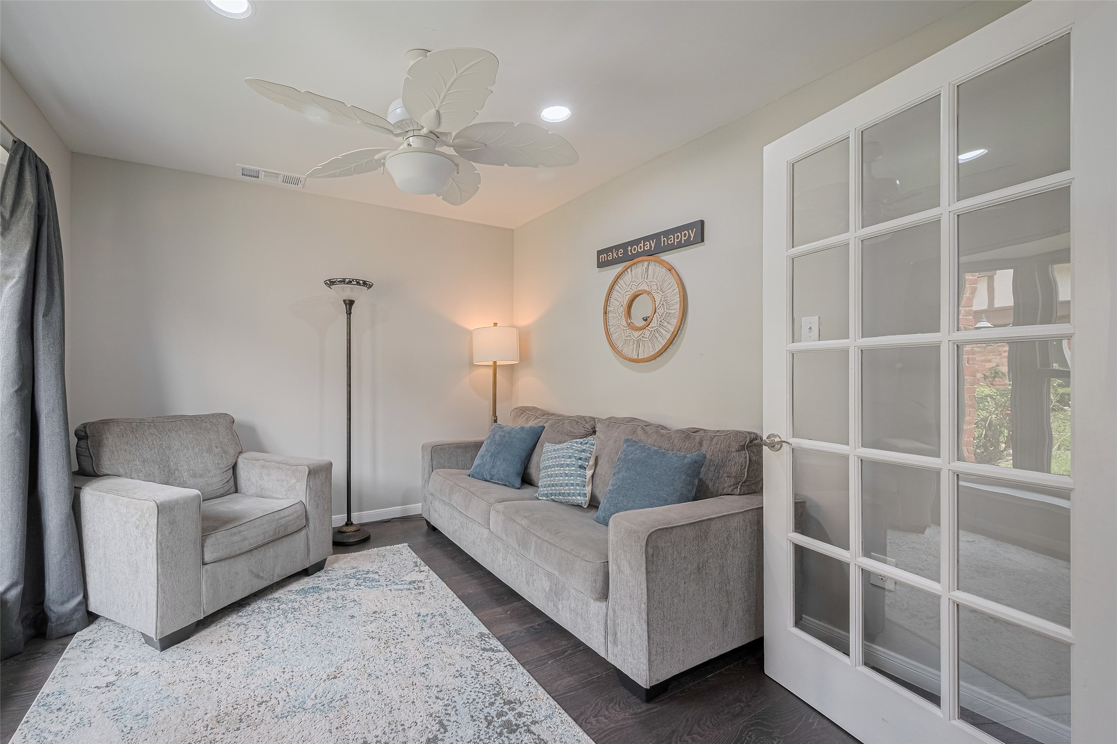 14688 Perthshire Road, Unit C Houston, TX 77079 - Photo 4 of 42 a living room with furniture and a large window