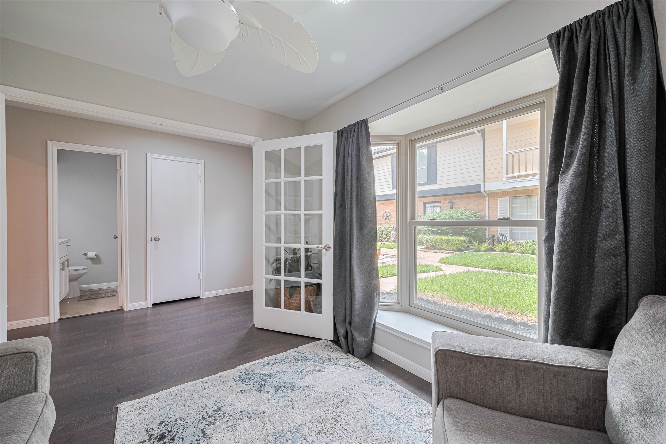 14688 Perthshire Road, Unit C Houston, TX 77079 - Photo 5 of 42 a view of livingroom with furniture and window