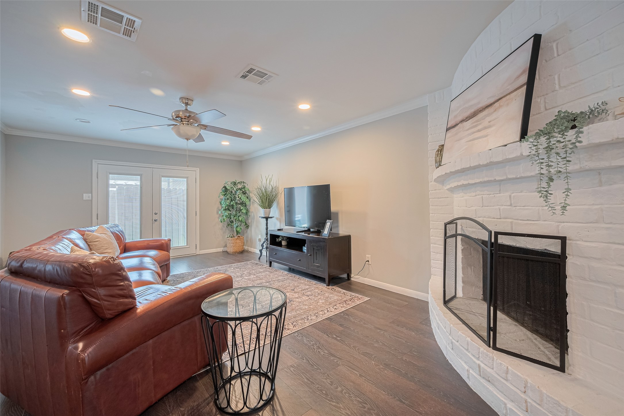 14688 Perthshire Road, Unit C Houston, TX 77079 - Photo 9 of 42 a living room with furniture and a fireplace