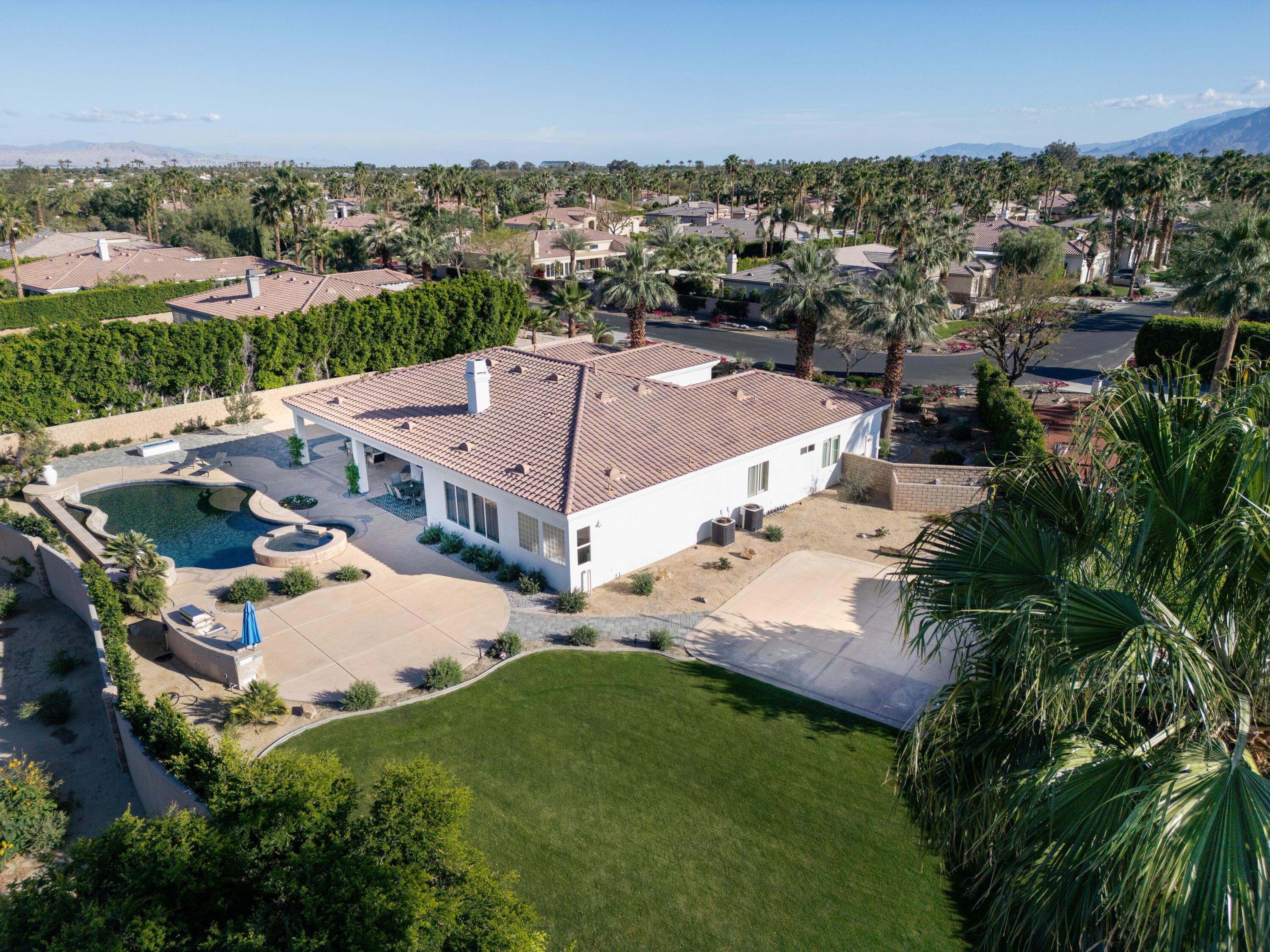 80262 Amazon Avenue Indio, CA 92201 - Photo 68 of 69 an aerial view of a house with a garden