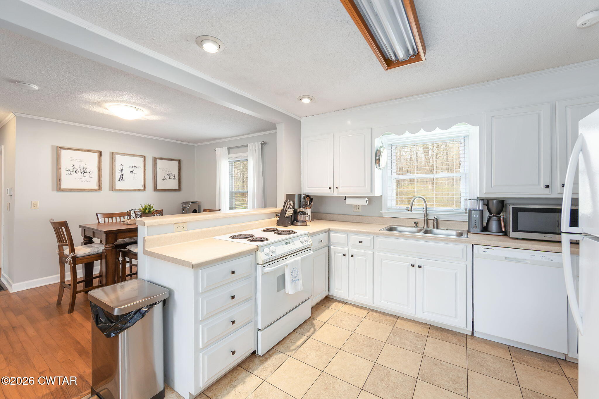 31 Mack Street Jackson, TN 38305 - Photo 13 of 23 a kitchen with granite countertop a sink and appliances