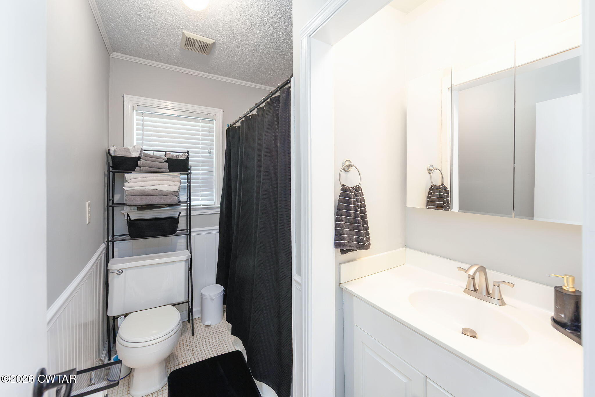 31 Mack Street Jackson, TN 38305 - Photo 16 of 23 a bathroom with a sink toilet and shower