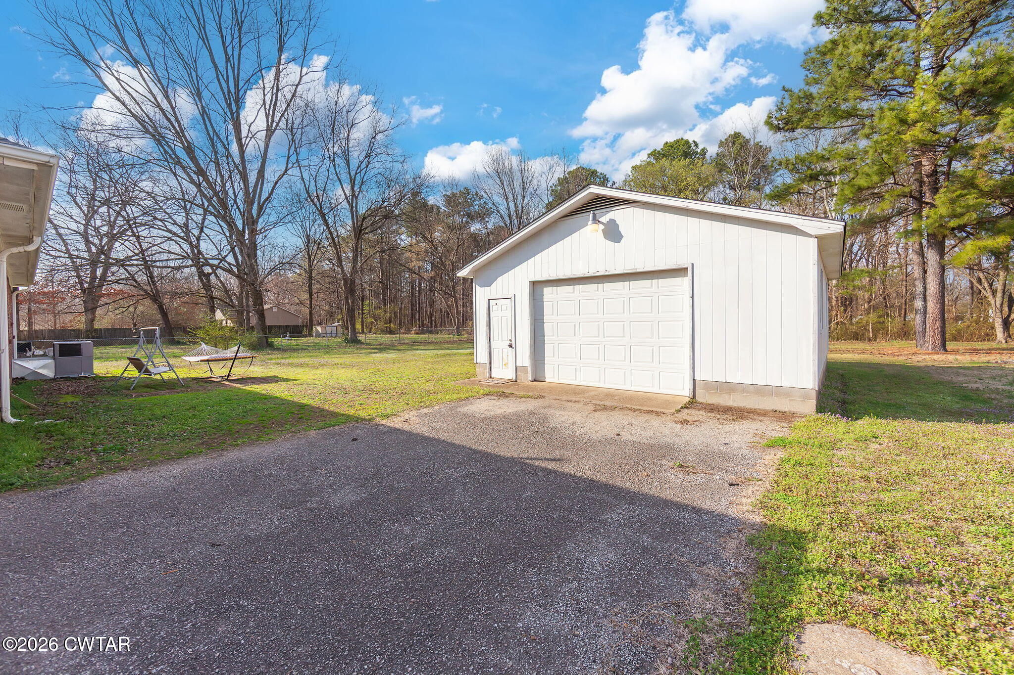 31 Mack Street Jackson, TN 38305 - Photo 19 of 23 a view of a house with backyard and trees