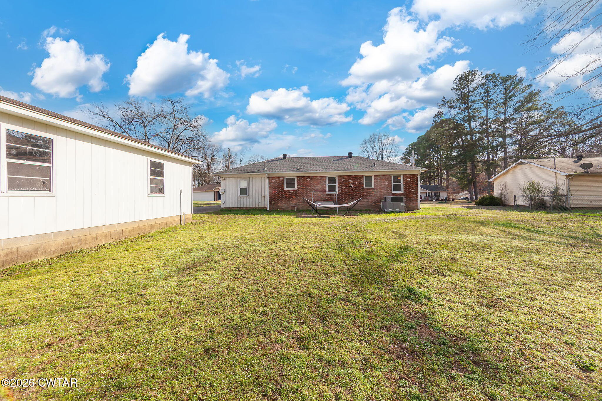 31 Mack Street Jackson, TN 38305 - Photo 21 of 23 a view of a house with yard and sitting area