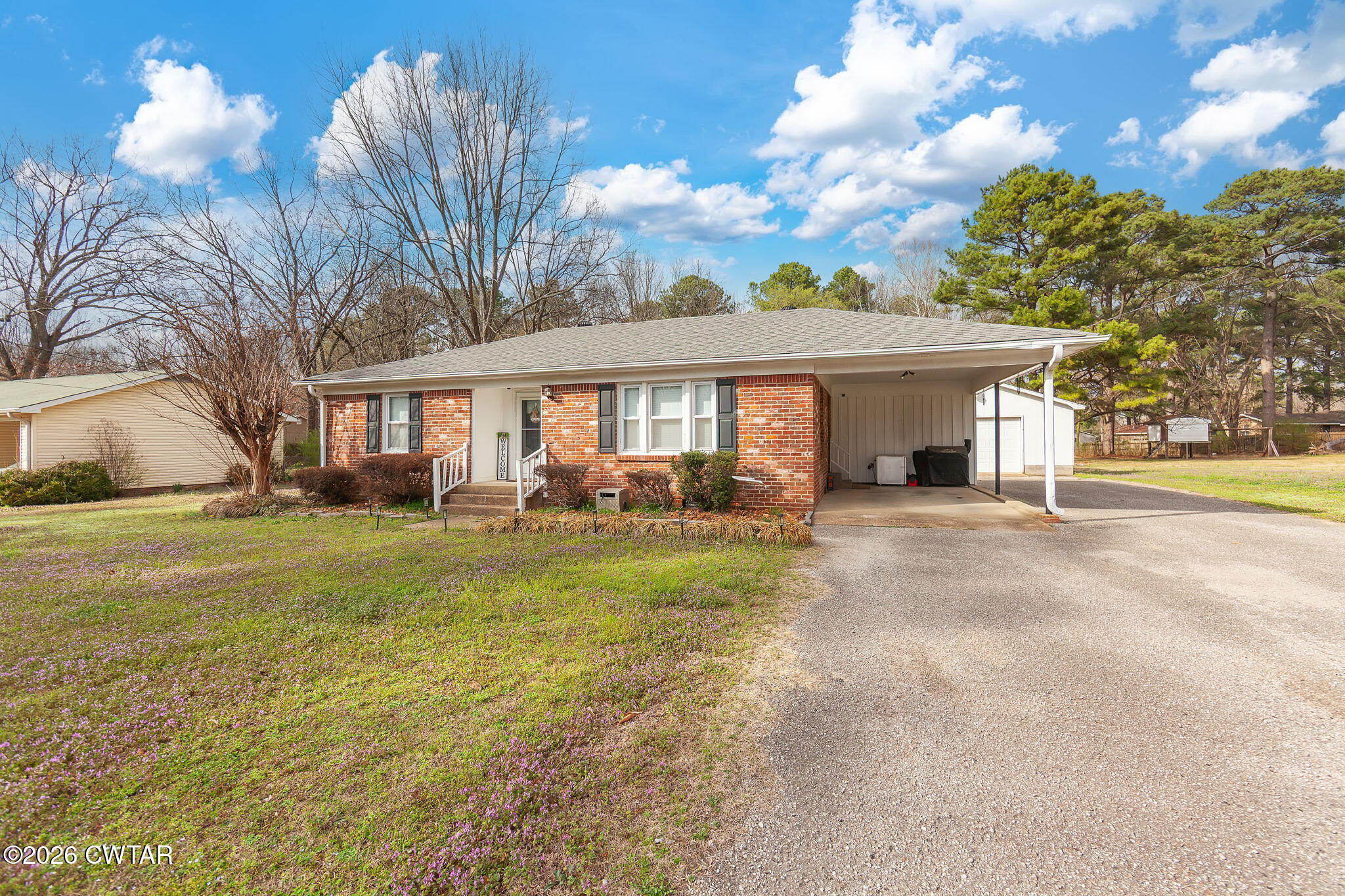 31 Mack Street Jackson, TN 38305 - Photo 3 of 23 a front view of a house with yard and green space
