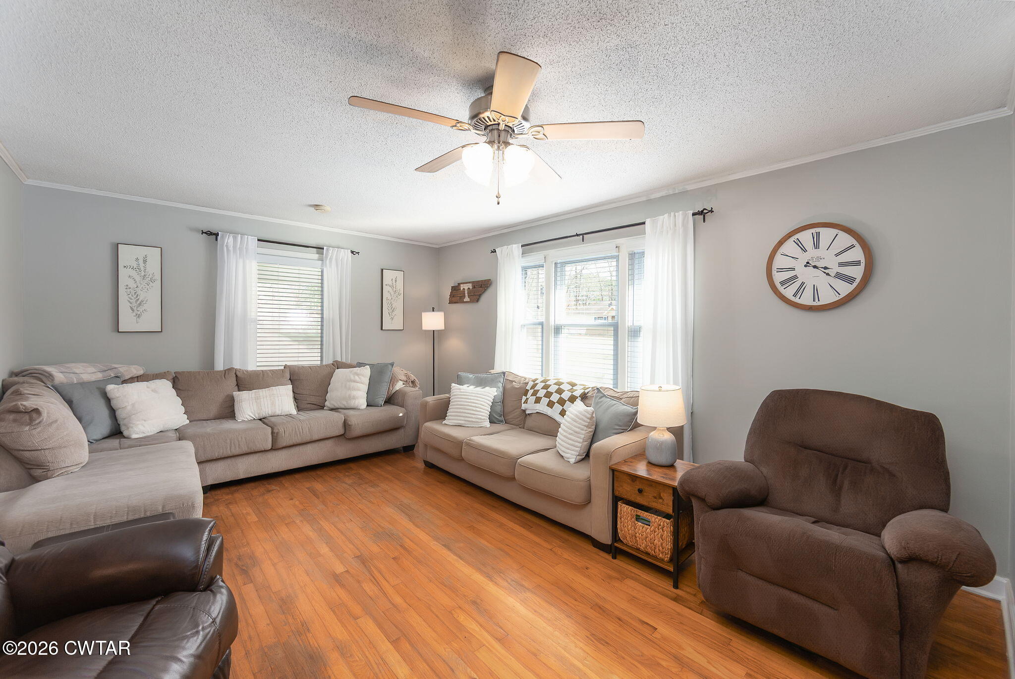 31 Mack Street Jackson, TN 38305 - Photo 6 of 23 a living room with furniture and a large window