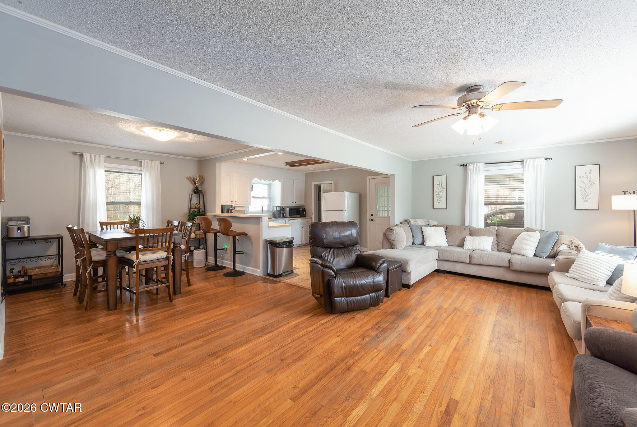 31 Mack Street Jackson, TN 38305 - Photo 8 of 23 a living room with furniture and wooden floor