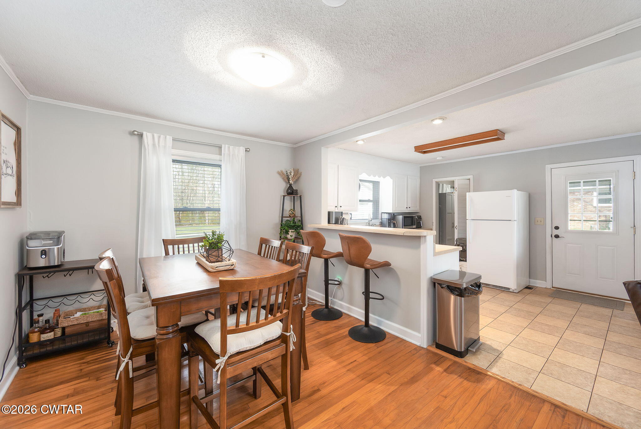 31 Mack Street Jackson, TN 38305 - Photo 9 of 23 a view of a dining room with furniture and wooden floor