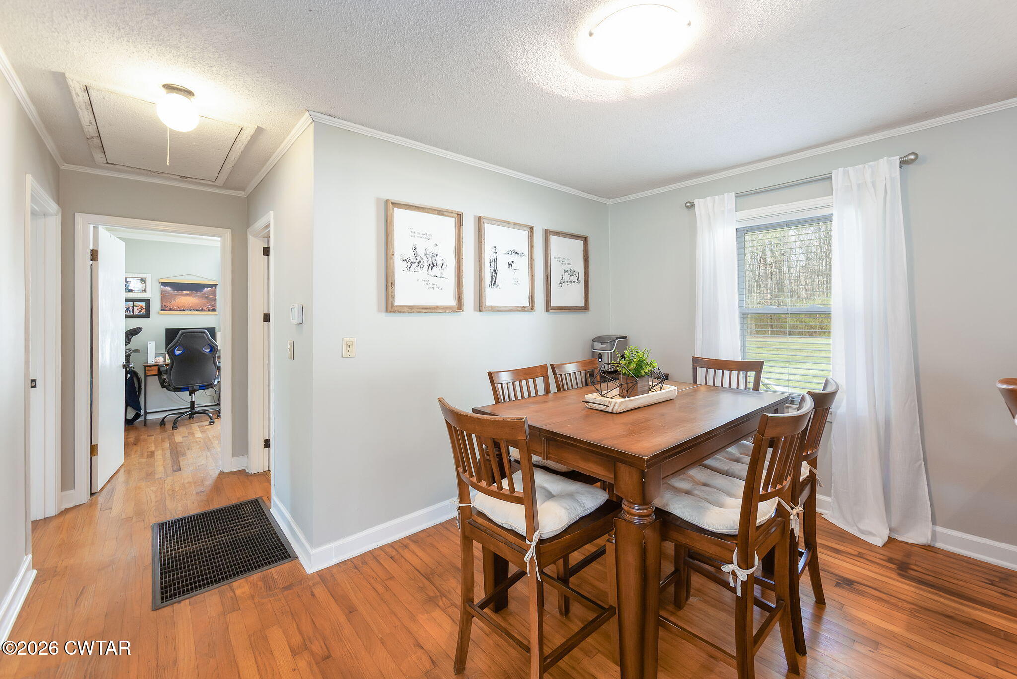 31 Mack Street Jackson, TN 38305 - Photo 10 of 23 a view of a dining room with furniture and wooden floor