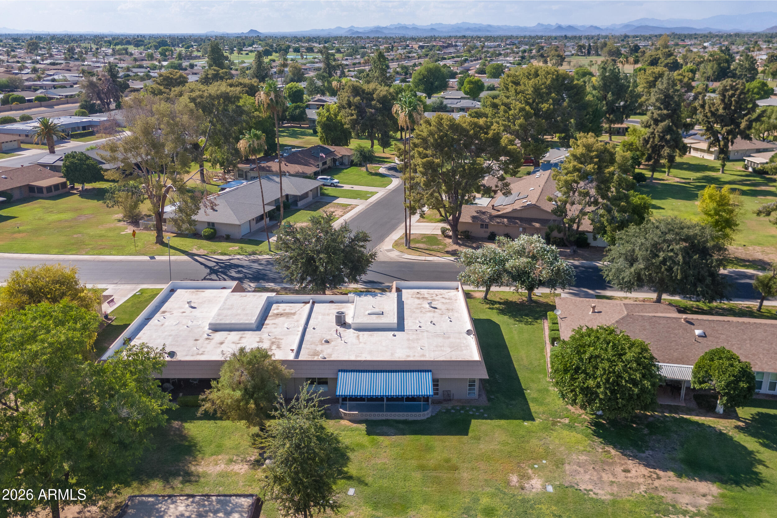 9801 West Pleasant Valley Road Sun City, AZ 85351 - Photo 26 of 26 an aerial view of a house with a garden