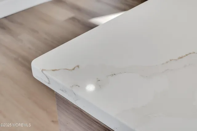 a kitchen with stainless steel appliances a refrigerator sink and cabinets