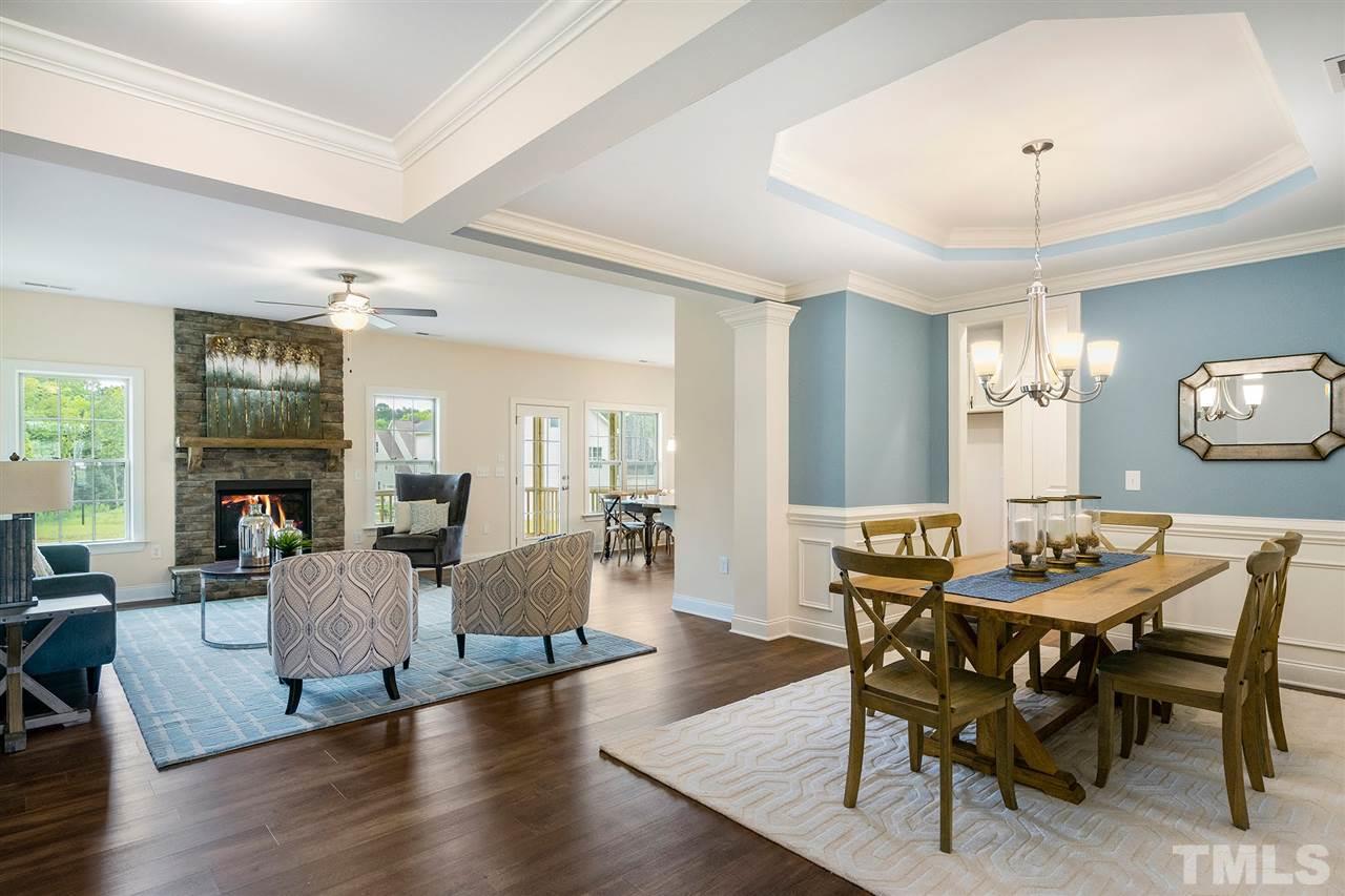 59 Ramsgate Drive Clayton, NC 27520 - Photo 4 of 4 a view of a a dining room with furniture window and wooden floor