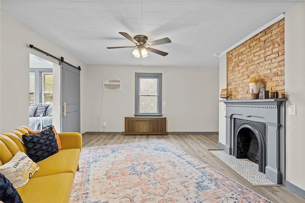 406 Center Road Monroeville, PA 15146 - Photo 14 of 25 a living room with furniture and a fireplace