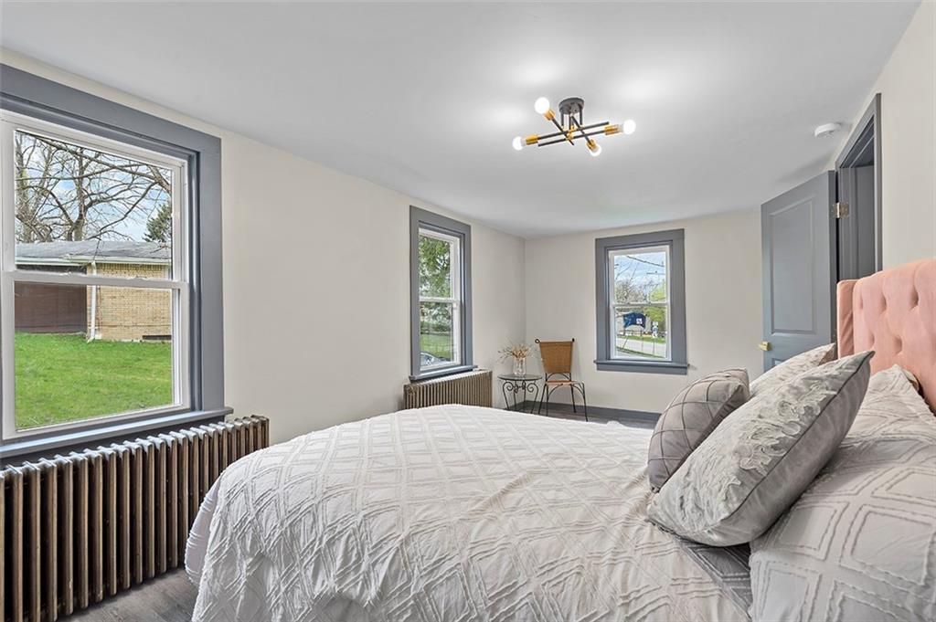 406 Center Road Monroeville, PA 15146 - Photo 16 of 25 a bedroom with a large bed and a window
