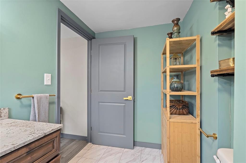 406 Center Road Monroeville, PA 15146 - Photo 21 of 25 a view of hallway with washer and dryer