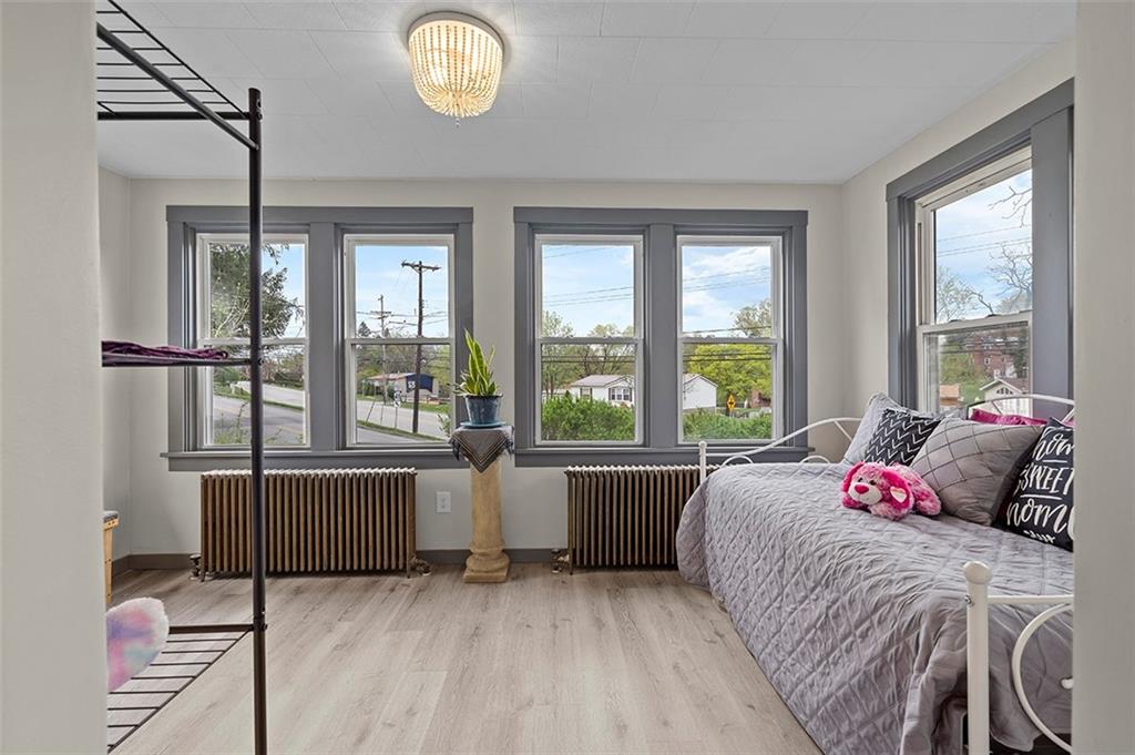 406 Center Road Monroeville, PA 15146 - Photo 24 of 25 a bed room with a bed and a large window