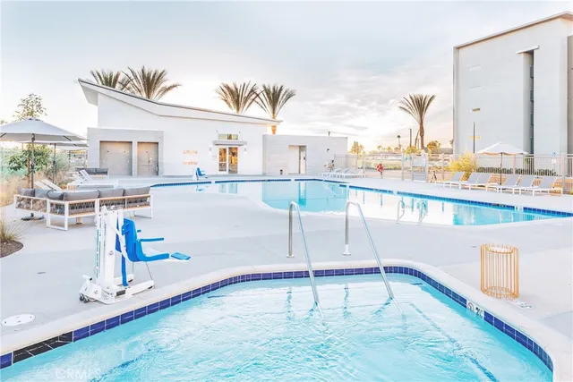 a view of a living room and kitchen