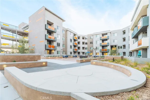 a view of swimming pool with outdoor seating