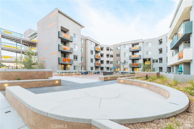 a view of swimming pool with outdoor seating