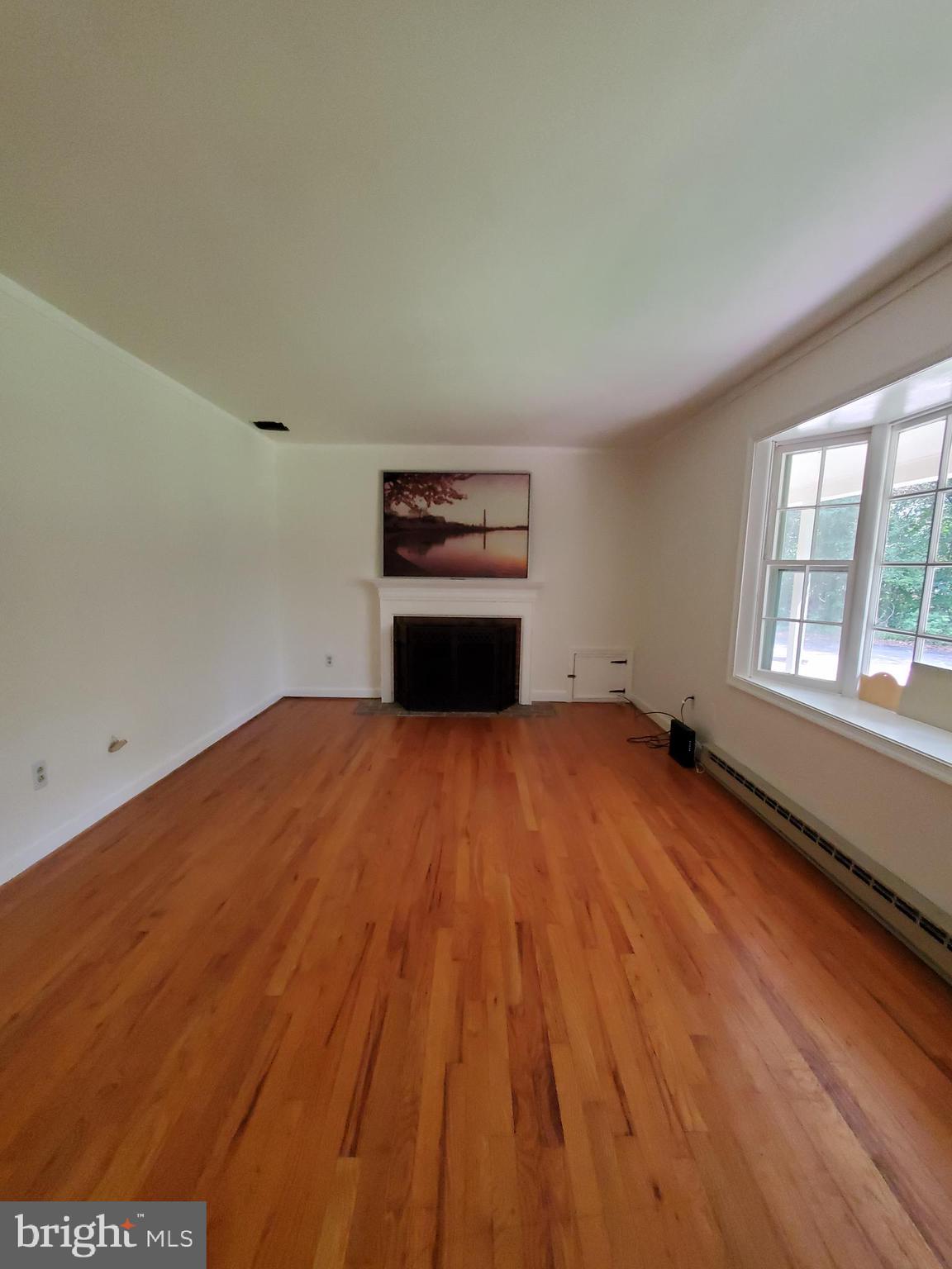 6909 Howellsville Road Boyce, VA 22620 - Photo 8 of 15 Large living room with bay window- country views!