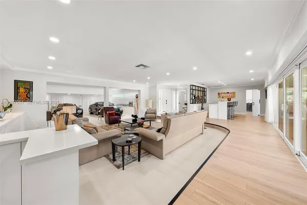 a living room with furniture and a table