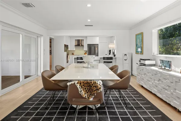 a living room with lots of furniture and a flat screen tv