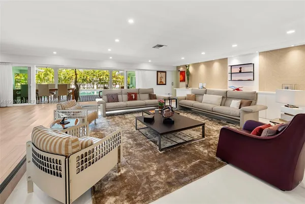 a view of a living room and kitchen floor