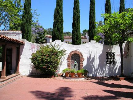 1811 El Encanto Road Santa Barbara, CA 93103 - Photo 3 of 14 a front view of a house with yard