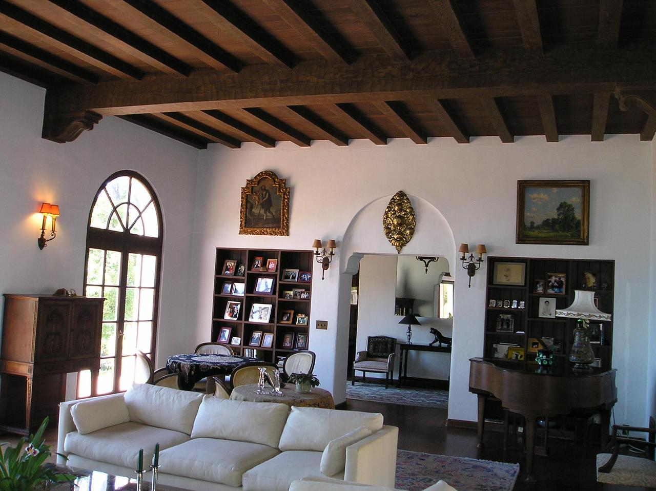1811 El Encanto Road Santa Barbara, CA 93103 - Photo 6 of 14 a living room with furniture a rug and a fireplace