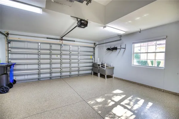 a view of a livingroom with racks and a window