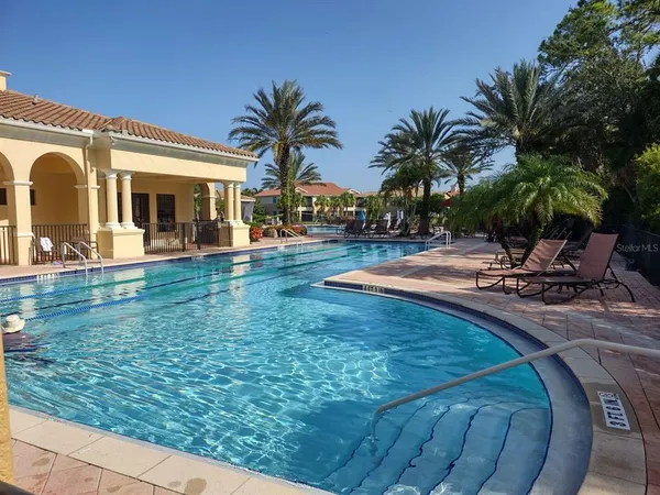 a view of the front of house with outdoor seating