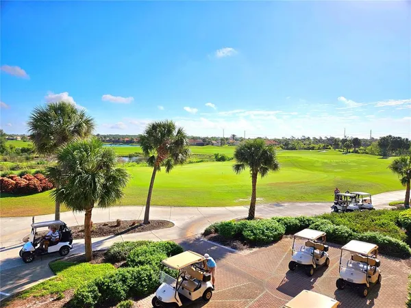 a view of a street with a table and a fire pit